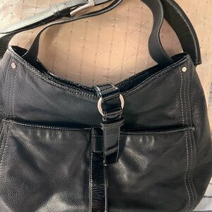 Black Cole Haan leather shoulder bag w/ patent leather trim & silver buckle